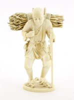 Lot 616 - A Japanese ivory okimono