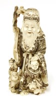 Lot 620 - A Japanese ivory okimono