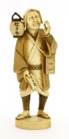 Lot 621 - A Japanese ivory okimono