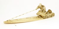 Lot 624 - A Japanese ivory okimono