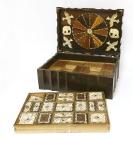 Lot 425 - An Indo-Portuguese coromandel box of serpentine form