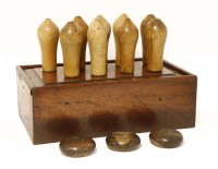 Lot 435 - A turned beech and lignum vitae table skittles set