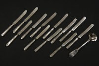 Lot 129 - A set of twelve early 20th century silver-handed reed and ribbon pattern fruit knives