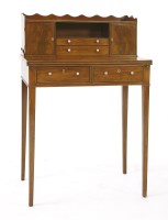 Lot 1185 - A George III strung mahogany bonheur-du-jour