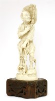 Lot 295 - A Japanese ivory okimono