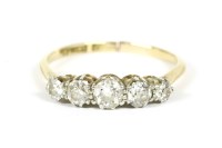 Lot 21 - A gold five stone graduated diamond ring