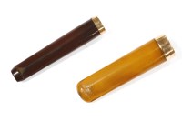 Lot 40 - Two cased amber cheroot holders