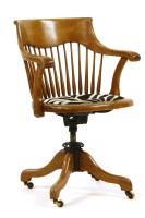 Lot 624 - A zebra upholstered desk chair