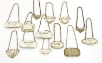 Lot 122 - A small collection of antique and modern silver wine labels