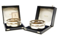 Lot 126 - Two modern silver bottle coasters