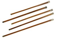 Lot 441 - Five Eastern white metal handled walking canes