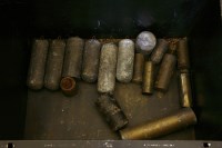 Lot 304A - A tin trunk of longcase clock weights