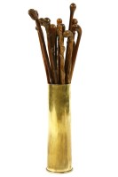 Lot 442 - A collection of predominately carved root wood walking sticks