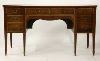 Lot 358 - A George III style mahogany breakfront mahogany side board