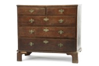 Lot 447 - A George III oak chest of two short above three long drawers