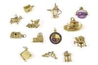 Lot 6 - Thirteen gold charms
