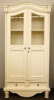 Lot 354 - A French style painted pine half glazed cupboard