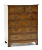Lot 478 - A walnut bow fronted chest of drawers. 77 x 50 x 98cm high