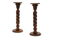 Lot 472 - A pair of carved mahogany open twist turned columns