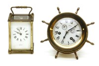 Lot 129 - A small Schatz ships wheel clock