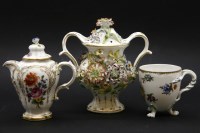 Lot 130 - An early 19th century floral encrusted twin handled vase and cover