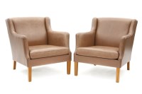 Lot 379 - A pair of 1960's Danish pale brown leather tub chairs