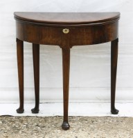 Lot 370 - A George II fold over tea table