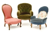 Lot 421 - A green upholstered Victorian button back armchair