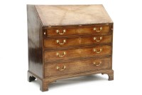 Lot 329 - A George III mahogany and cross banded bureau