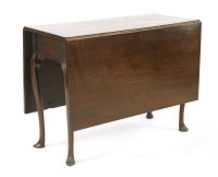 Lot 458 - A 18th century mahogany drop flap gate leg dining table