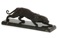 Lot 275 - A bronzed figure of a prowling leopard
