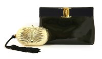 Lot 1106 - A Salvatore Ferragamo navy patent clutch handbag