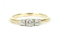 Lot 23 - A 9ct gold three stone diamond ring