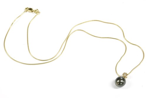 Lot 12 - A single cultured freshwater and diamond pearl pendant