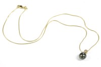 Lot 12 - A single cultured freshwater and diamond pearl pendant
