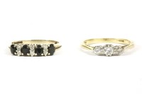 Lot 20 - An 18ct gold three stone diamond ring