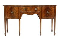 Lot 513 - A George III design inlaid mahogany serpentine sideboard