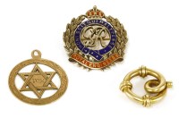 Lot 91 - A 9ct gold red and blue enamel Royal Engineer's brooch