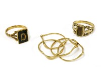 Lot 83 - A 9ct gold four row puzzle ring