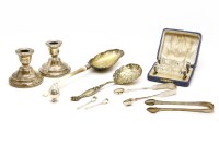 Lot 188 - A pair of silver dwarf candlesticks