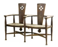 Lot 149 - An Arts and Crafts oak settle