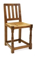 Lot 163 - A Robert ‘Mouseman’ Thompson oak typist’s chair