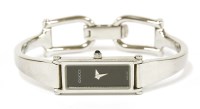Lot 3 - A ladies stainless steel Gucci 1500L quartz bangle watch
