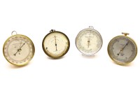 Lot 356 - A brass cased aneroid barometer