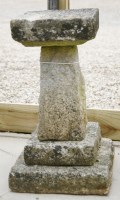 Lot 559 - A stone bird bath