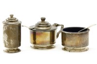 Lot 95 - An Art Deco silver three piece cruet by Edward Barnard & Sons
