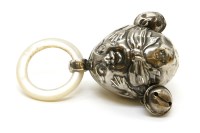 Lot 93 - An Edwardian silver 'Humpty Dumpty' rattle
