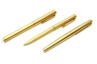 Lot 77 - A yellow metal Dunhill fountain pen and ball point set