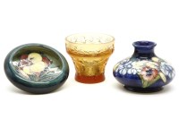 Lot 176 - A squat Moorcroft vase decorated with iris