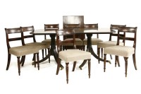 Lot 467 - A reproduction twin pillar dining table
